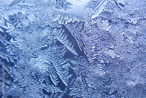 macro ice on the glass in winter Patterned like leaves	
