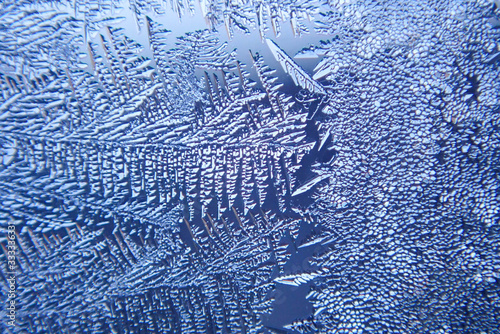 macro ice on the glass in winter Patterned like leaves	