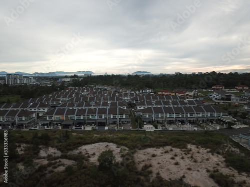 Kuching, Sarawak / Malaysia - March 26, 2020: The Samajaya Industrial Zone and the Tabuan Tranquility commercial area, condominium and residential houses photo