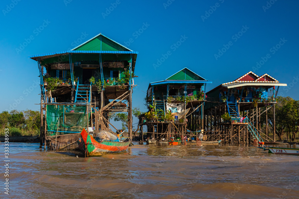 Φωτογραφία Kampong Phluk Floating Village on the Tonle Sap lake near Siem Reap, Cambodia during sunset