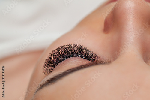 Canvas Print Woman Eye with Long Eyelashes Extension. Lashes.