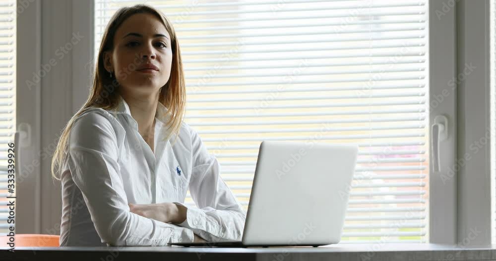 cheering proud young woman at laptop cheering proud young woman at laptop