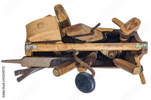 Vintage WoodenTool Box Full of carpentry Tools. Isolated on a white background.  Top view photo