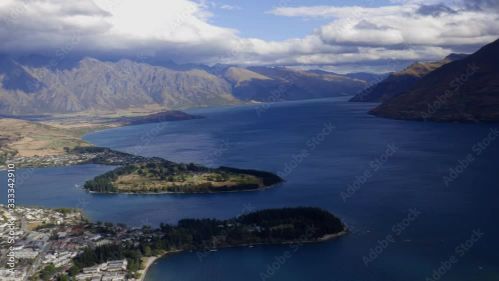 Wide panoramic panning shot of Queenstown, Remarkables and Cecil's peak. Queenstown, Otago, New Zealand Wide panoramic panning shot of Queenstown, Remarkables and Cecil's peak. Queenstown, Otago, New Zealand