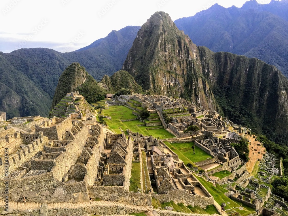 A unique and interesting view of the ancient Inca site of Machu Picchu, nestled high in the Andes Mountains of Peru