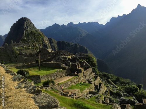 A unique and interesting view of the ancient Inca site of Machu Picchu, nestled high in the Andes Mountains of Peru