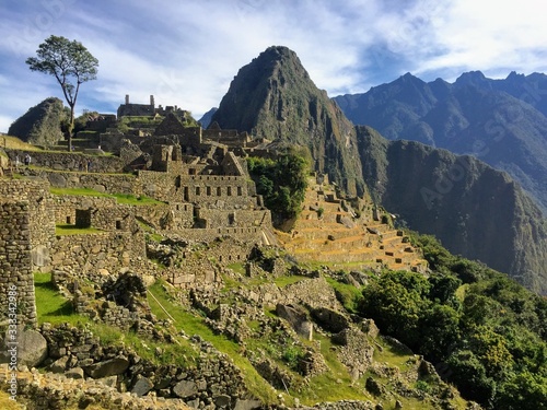 A unique and interesting view of the ancient Inca site of Machu Picchu, nestled high in the Andes Mountains of Peru