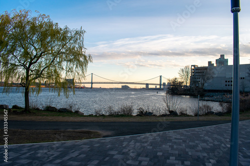 The View of the Penn Treaty Park of the Ben Franklin Bridge at Sunset photo