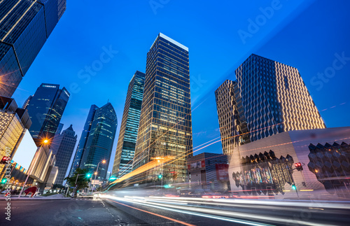 Office building and street night view in Lujiazui Financial District, Shanghai..
