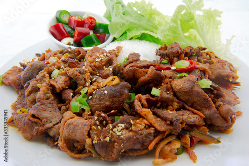 Stir fried with pork and vegetables sprinkle sesame seeds