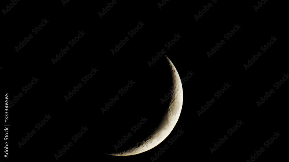 new moon in the sky, black background, moon was filmed at night 4K timelapse. new moon in the sky, black background, moon was filmed at night 4K timelapse.