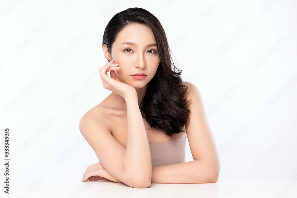 Beautiful Young Asian Woman with Clean Fresh Skin. Face care, Facial treatment, Cosmetology, beauty and healthy skin and cosmetic concept, woman beauty skin isolated on white background Beautiful Young Asian Woman with Clean Fresh Skin. Face care, Facial treatment, Cosmetology, beauty and healthy skin and cosmetic concept, woman beauty skin isolated on white background