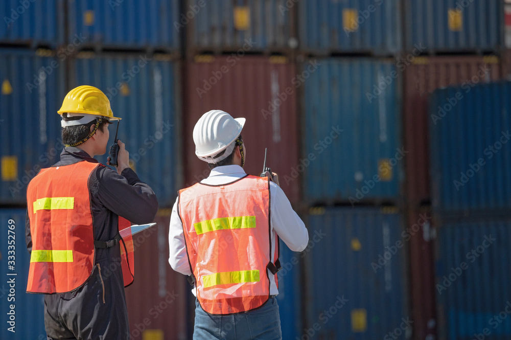 foreman-control-loading-containers-box-from-cargo-freight-ship-for