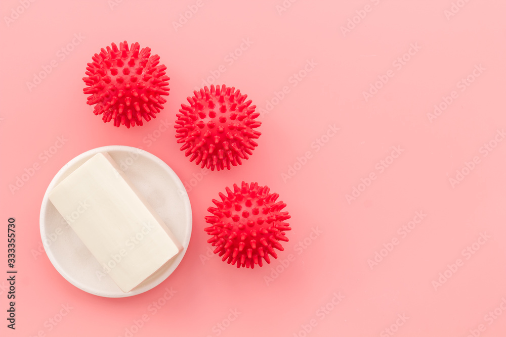 Coronavirus and soap on pink background top-down copy space Coronavirus and soap on pink background top-down copy space