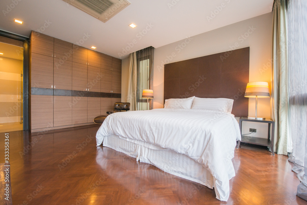 Fototapeta premium Bright Interior of cozy bedroom in modern design