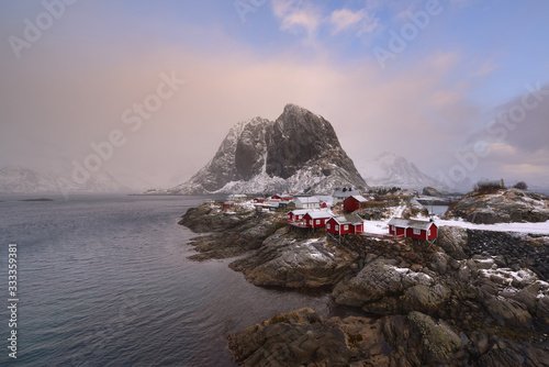 Norwegian Rorbu houses on the rocky beach, Lofoten Islands, Norway