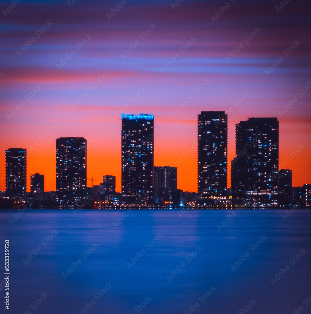 Fototapeta premium city skyline colors night cityscape skyscraper architecture aquatic downtown miami florida usa sky buildings sunset panorama prints beautiful