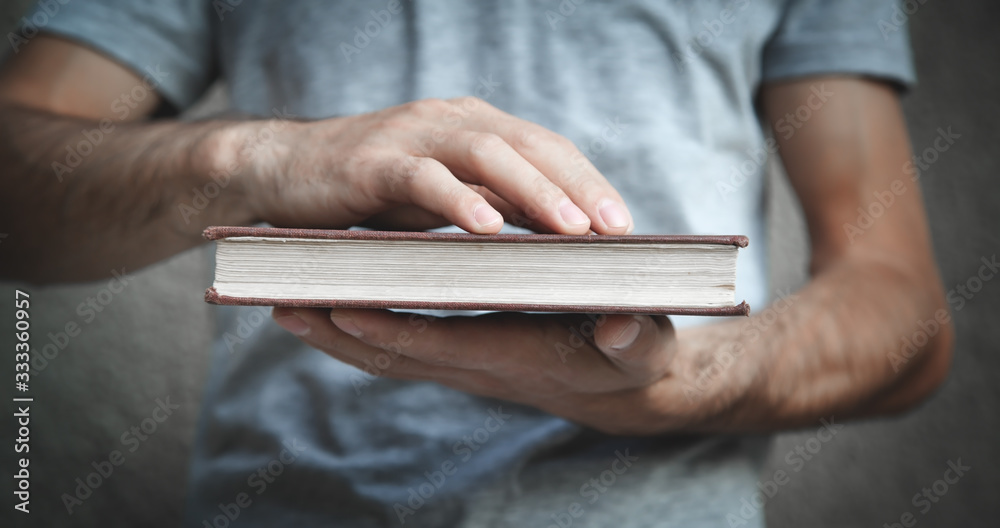 Caucasian man holding bible. Religion Caucasian man holding bible. Religion