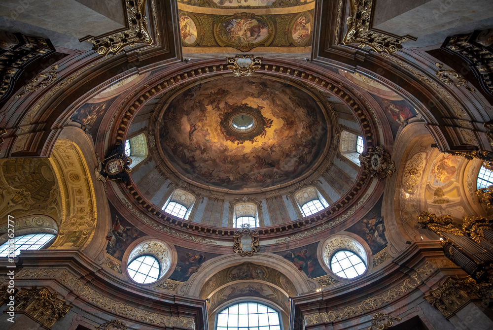 Vienna, Austria - Interior view of famous cupola of baroque Roman Catholic parish St. Peter's Church (Peterskirche) on Petersplatz. Details of the dome's frescoes.