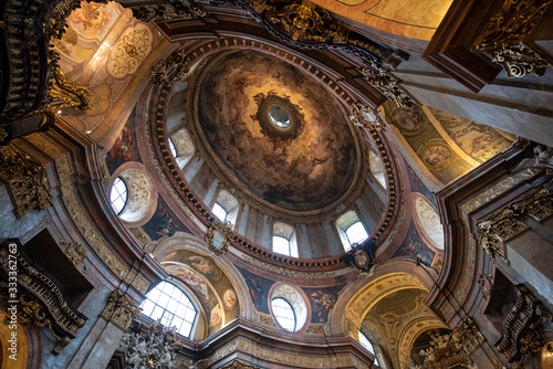 Vienna  Austria - Interior view of famous cupola of baroque Roman Catholic parish St. Peter s Church  Peterskirche  on Petersplatz. Details of the dome s frescoes.