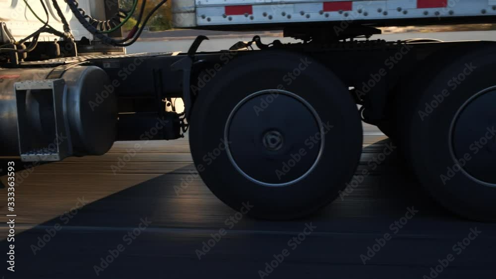 Passing a semi truck tractor trailer on the highway