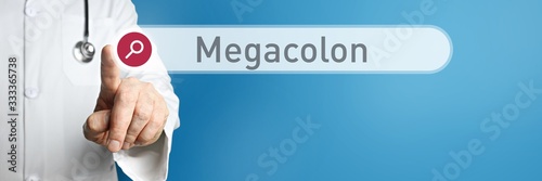 Megacolon. Doctor in smock points with his finger to a search box. The word Megacolon is in focus. Symbol for illness, health, medicine photo