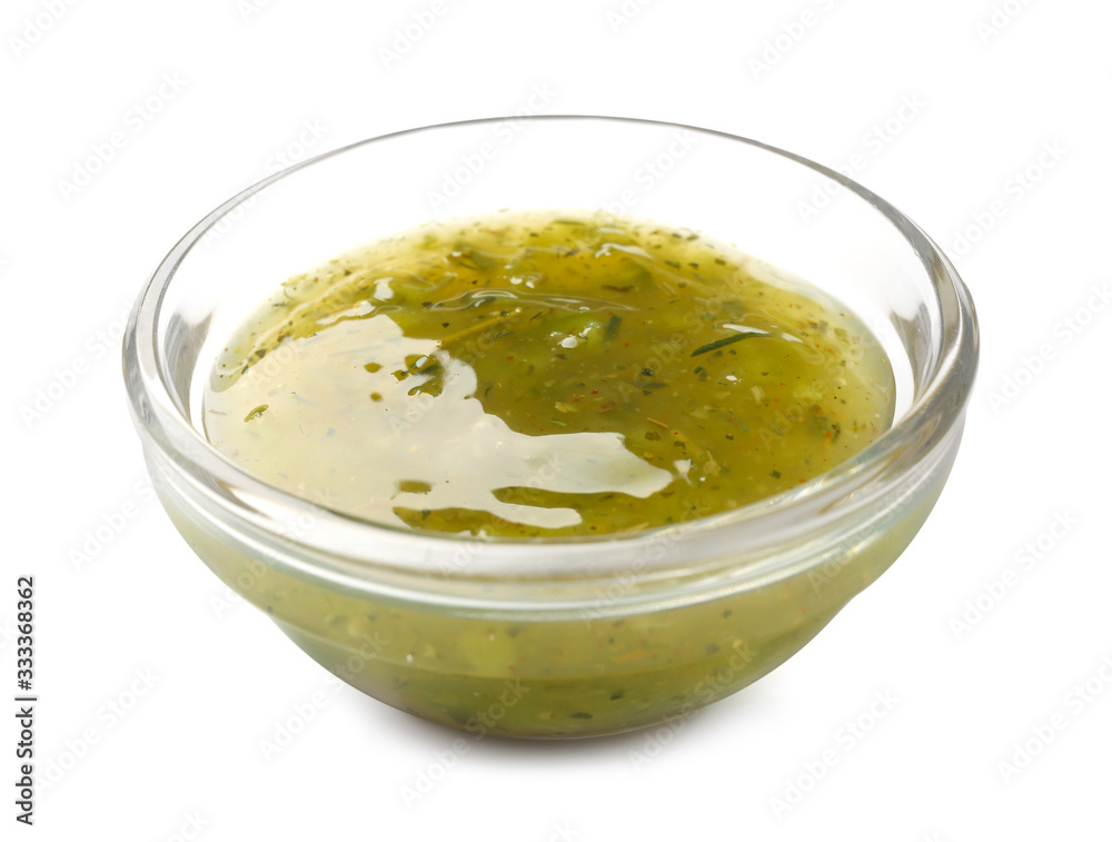 Bowl with tasty sauce on white background Bowl with tasty sauce on white background