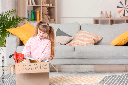Little girl with donations ...