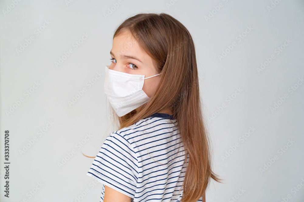 teen girl in medical mask on white background teen girl in medical mask on white background