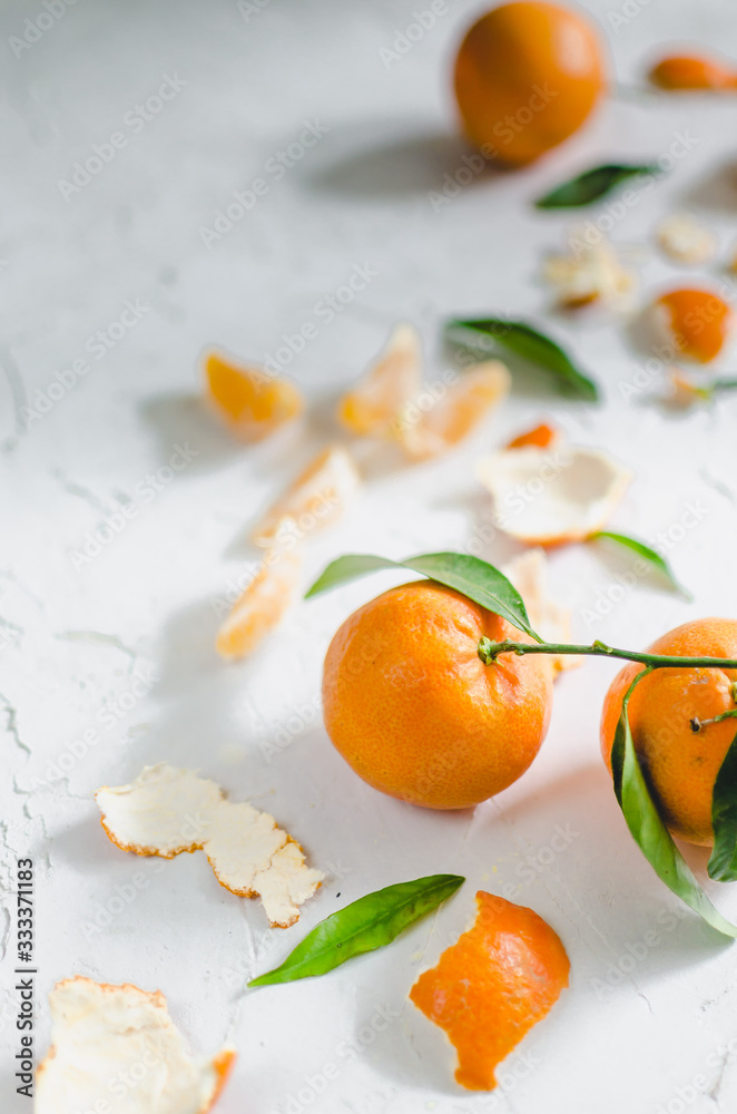 Clementines with their leaves and skin Clementines with their leaves and skin