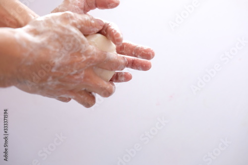 washing your hands on white background and washing every time for coronavirus protection