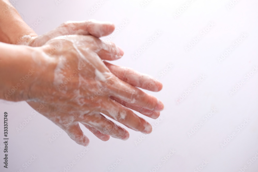 washing hands with liquid soap and sponge washing hands with liquid soap and sponge