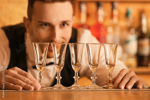 Handsome male bartender wit...