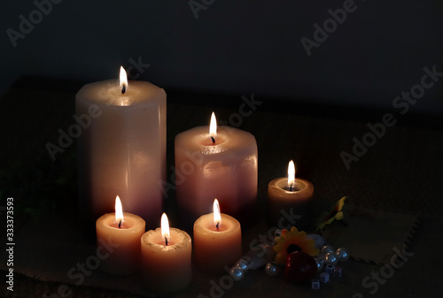 set candles flame on black background