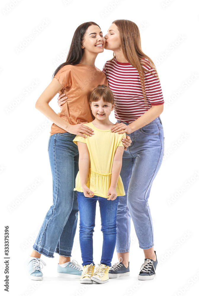 Happy lesbian couple with little adopted girl on white background Happy lesbian couple with little adopted girl on white background