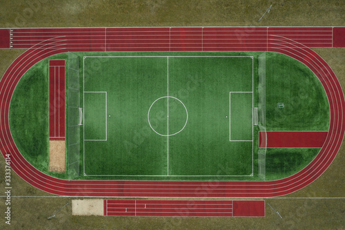 Field for training. Field for various sports. Running track. The view from the top. Drone shot