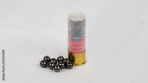 12 gauge shotgun ammunition on a white background