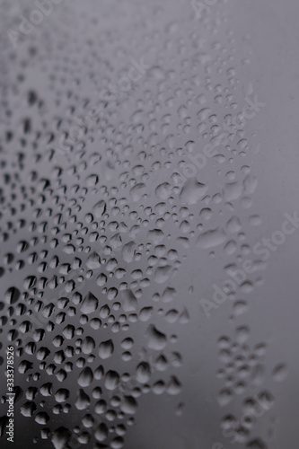 drops on glass after rain, closeup 