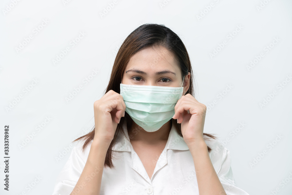 White shirts wearing medical masks to prevent the flu and the Covid-19 Corona virus and carrying a mask. White shirts wearing medical masks to prevent the flu and the Covid-19 Corona virus and carrying a mask.