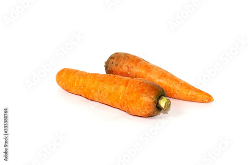 fresh and natural carrots isolated on white background for making salad