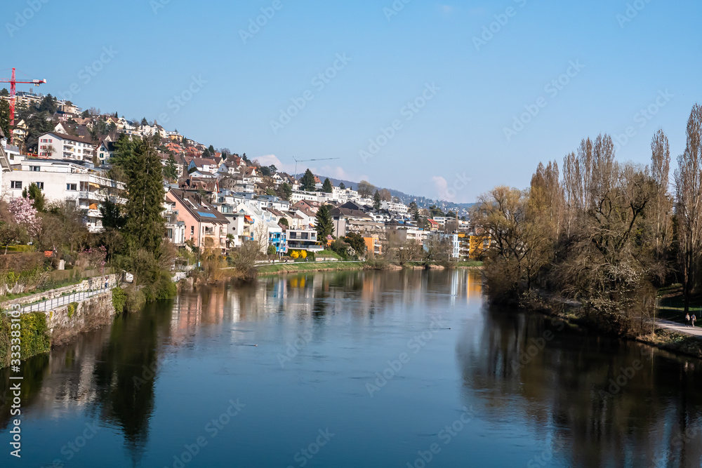 ZURICH, SWITZERLAND - MARCH 19, 2020: Area of Zurich along the bank of the river Limmat