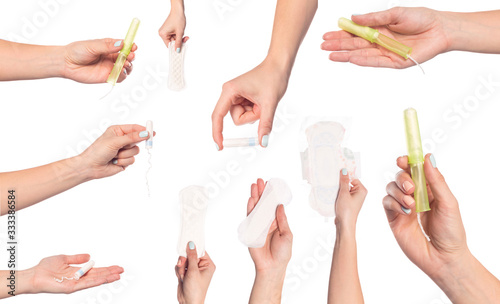 set of  female  hands  holding care objects  -  pads and tampon sisolated on white background - Image photo