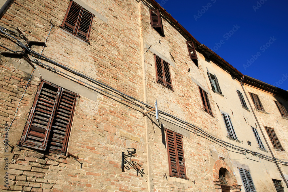 Corinaldo (AN), Italy - January 1, 2019: View of an old facade in Corinaldo village, Corinaldo, Ancona, Marche, Italy Corinaldo (AN), Italy - January 1, 2019: View of an old facade in Corinaldo village, Corinaldo, Ancona, Marche, Italy