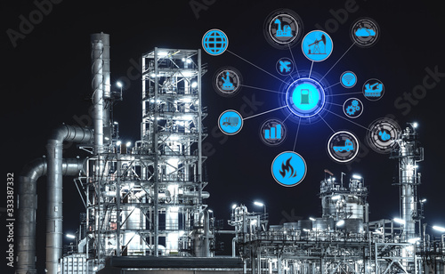 Industry 4.0 concept of Oil refinery with global energy network icon, Industrial petrochemical plant at night, Thailand