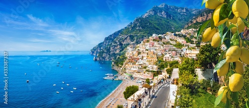 Panoramic view of Positano with comfortable beaches and blue sea on Amalfi Coast in Campania, Italy. Amalfi coast is popular travel and holyday destination in Europe.