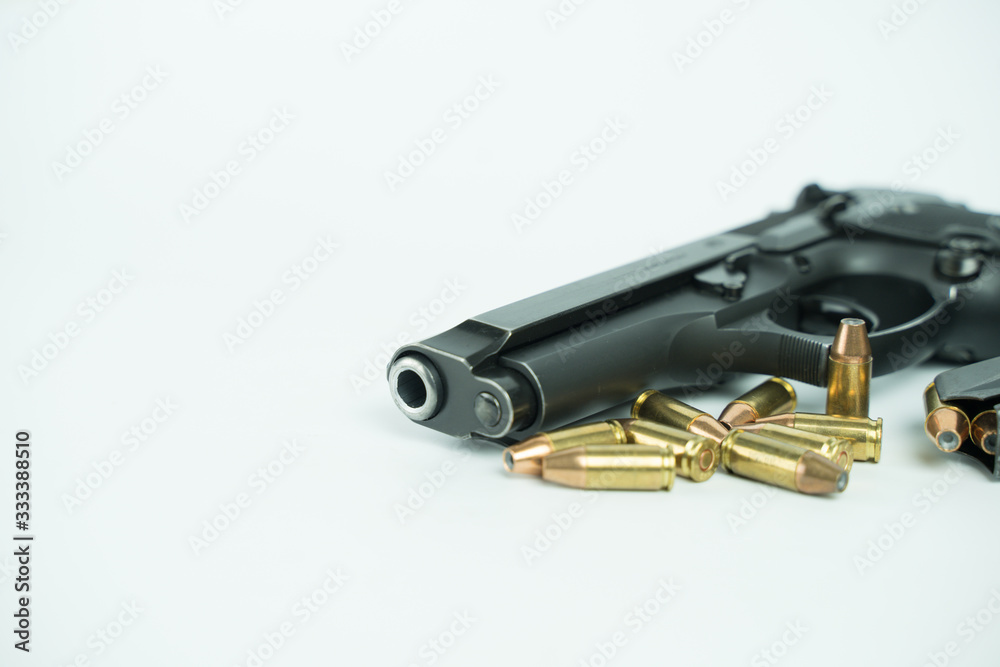 Black gun and ammunition on white background. Baretta 92