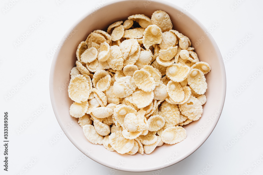 Closeup of a bowl with corn flakes Closeup of a bowl with corn flakes