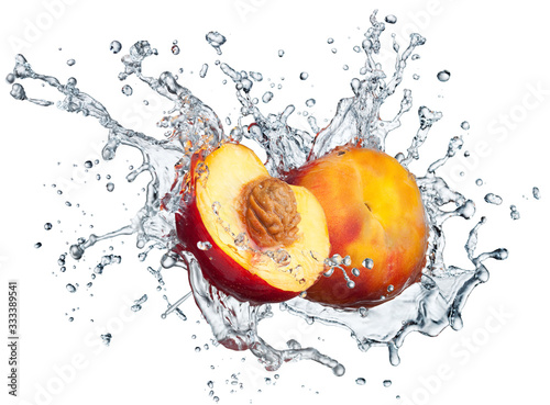 Peach in spray of water.