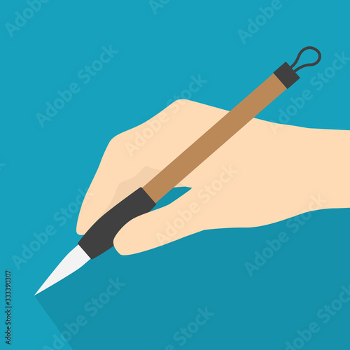 hand holding japanese writing brush -vector illustration