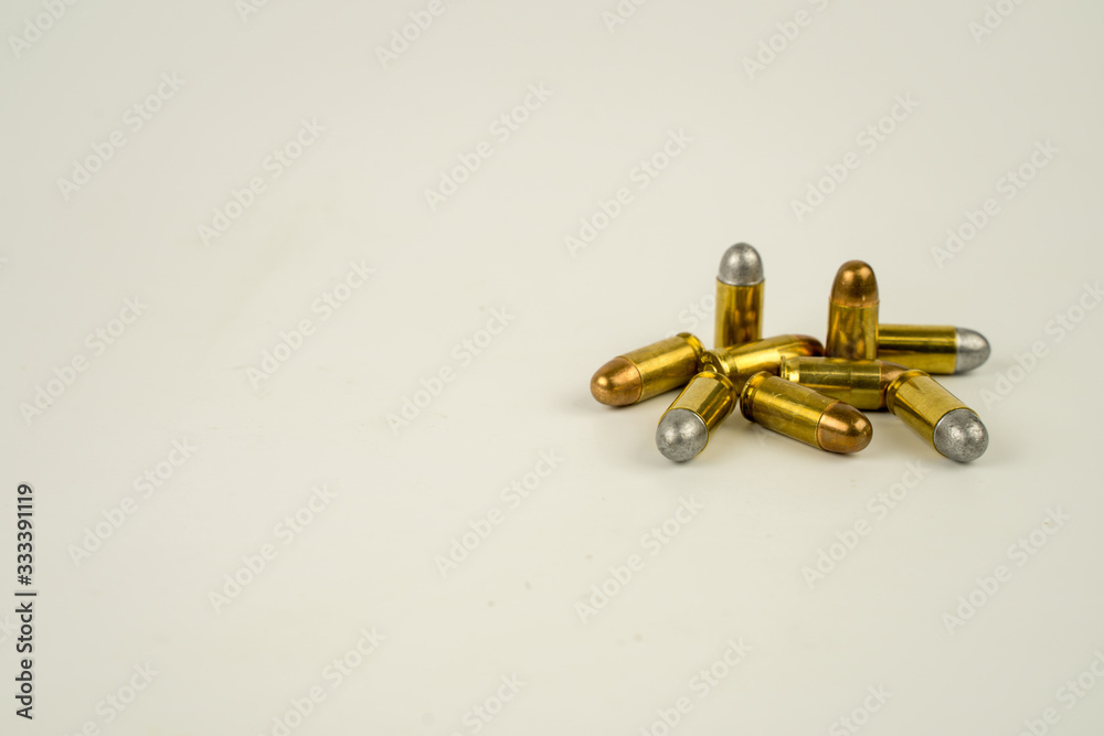 .45 acp bullet on white background.